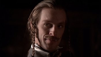 Movie still from “The Duellists” (1977), directed by Ridley Scott – A person with long hair; Close Up shot, Low angle