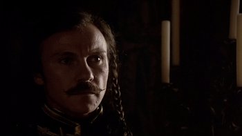 Movie still from “The Duellists” (1977), directed by Ridley Scott – A person with a mustache; Close Up shot, Low angle