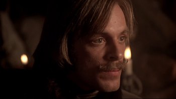Movie still from “The Duellists” (1977), directed by Ridley Scott – A person with a mustache; Close Up shot, Low angle
