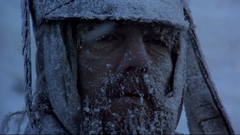Movie still from “The Duellists” (1977), directed by Ridley Scott – A person wearing a hood; Close Up shot, Low angle