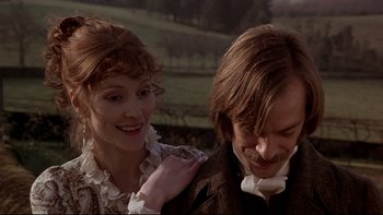 Movie still from “The Duellists” (1977), directed by Ridley Scott – A man and a woman standing next to each other; Close Up shot, Over the shoulder angle