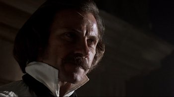 Movie still from “The Duellists” (1977), directed by Ridley Scott – A person with a beard and mustache; Close Up shot, Low angle
