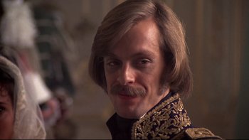 Movie still from “The Duellists” (1977), directed by Ridley Scott – A person with a mustache wearing a suit; Close Up shot, High angle