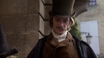 Movie still from “The Duellists” (1977), directed by Ridley Scott – A person wearing a top hat; Close Up shot, Low angle