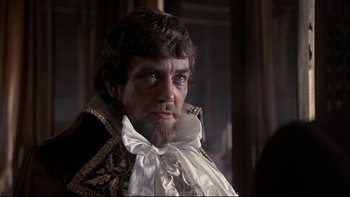 Movie still from “The Duellists” (1977), directed by Ridley Scott – A person with a beard; Close Up shot, Over the shoulder angle