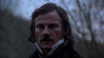 Movie still from “The Duellists” (1977), directed by Ridley Scott – A person with a mustache; Close Up shot, Low angle