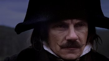 Movie still from “The Duellists” (1977), directed by Ridley Scott – A person wearing a hat; Close Up shot, Low angle