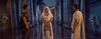 Movie still from “The Egyptian” (1954), directed by Michael Curtiz – A man dressed as an ancient egyptian ruler; Wide shot, High angle