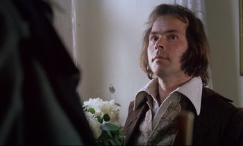Movie still from “The Enigma of Kaspar Hauser” (1974), directed by Werner Herzog – A man looking at himself in the mirror; Close Up shot, Over the shoulder angle