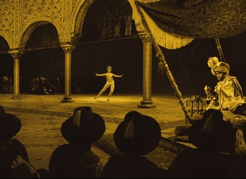 Movie still from “The Fabulous Baron Munchausen” (1962), directed by Karel Zeman – A person is dancing in a large open area; Wide shot, Low angle