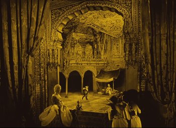 Movie still from “The Fabulous Baron Munchausen” (1962), directed by Karel Zeman – An old photo of a stage with people in it; Extreme Wide shot, High angle
