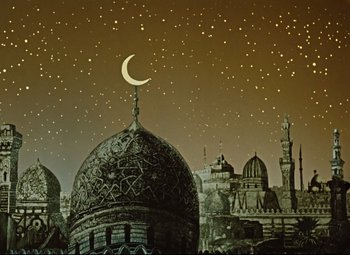 Movie still from “The Fabulous Baron Munchausen” (1962), directed by Karel Zeman – A night sky with the moon and stars above a mosque; Extreme Wide shot, Low angle