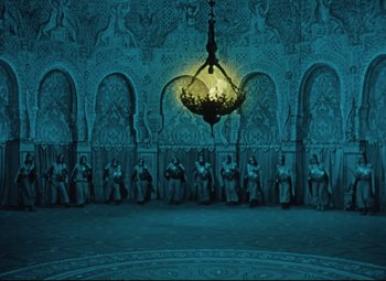 Movie still from “The Fabulous Baron Munchausen” (1962), directed by Karel Zeman – A chandelier hanging from the ceiling of a room; Extreme Wide shot, High angle