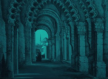 Movie still from “The Fabulous Baron Munchausen” (1962), directed by Karel Zeman – An image of an old building with arches in the middle of it; Extreme Wide shot, Low angle