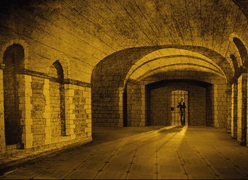 Movie still from “The Fabulous Baron Munchausen” (1962), directed by Karel Zeman – A person standing in a room with a brick wall; Extreme Wide shot, High angle