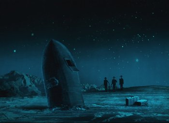 Movie still from “The Fabulous Baron Munchausen” (1962), directed by Karel Zeman – A group of people standing on top of an island in the middle of the ocean; Extreme Wide shot, Low angle