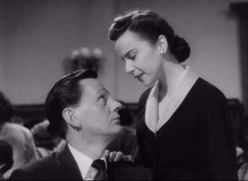 Movie still from “The File on Thelma Jordon” (1949), directed by Robert Siodmak – A man and a woman looking at one another; Medium shot, Low angle