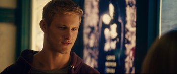 Movie still from “The Final Girls” (2015), directed by Todd Strauss-Schulson – A person wearing a jacket; Close Up shot, Over the shoulder angle