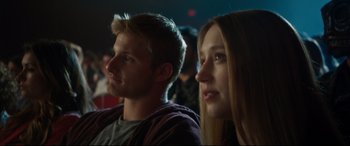 Movie still from “The Final Girls” (2015), directed by Todd Strauss-Schulson – A man and a woman sitting next to each other; Close Up shot, Over the shoulder angle
