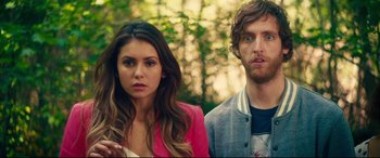 Movie still from “The Final Girls” (2015), directed by Todd Strauss-Schulson – A man and a woman standing next to each other in front of trees; Close Up shot, Over the shoulder angle