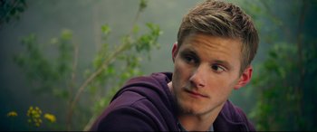 Movie still from “The Final Girls” (2015), directed by Todd Strauss-Schulson – A person wearing a purple hoodie; Close Up shot, Over the shoulder angle