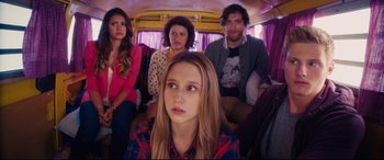 Movie still from “The Final Girls” (2015), directed by Todd Strauss-Schulson – A group of people sitting in a bus; Close Up shot, High angle