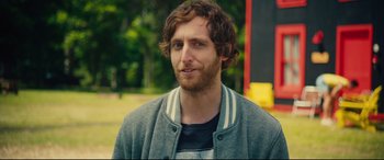 Movie still from “The Final Girls” (2015), directed by Todd Strauss-Schulson – A person wearing a jacket; Close Up shot, Over the shoulder angle