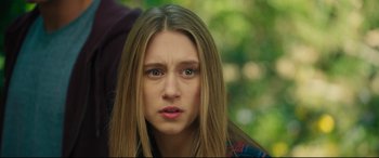 Movie still from “The Final Girls” (2015), directed by Todd Strauss-Schulson – A person with long brown hair; Close Up shot, Over the shoulder angle