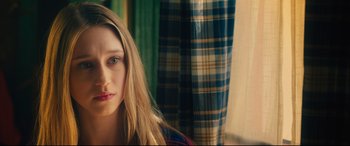 Movie still from “The Final Girls” (2015), directed by Todd Strauss-Schulson – A person with long blonde hair; Close Up shot, Over the shoulder angle