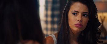 Movie still from “The Final Girls” (2015), directed by Todd Strauss-Schulson – A person with long black hair; Close Up shot, Over the shoulder angle