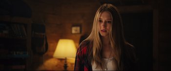 Movie still from “The Final Girls” (2015), directed by Todd Strauss-Schulson – A woman with long blonde hair standing in a room; Close Up shot, Over the shoulder angle