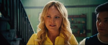 Movie still from “The Final Girls” (2015), directed by Todd Strauss-Schulson – A woman with blonde hair wearing a yellow shirt; Close Up shot, Over the shoulder angle