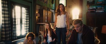 Movie still from “The Final Girls” (2015), directed by Todd Strauss-Schulson – A woman and a girl are standing in a room; Medium shot, High angle