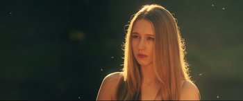 Movie still from “The Final Girls” (2015), directed by Todd Strauss-Schulson – A beautiful young woman with long blonde hair; Close Up shot, Low angle