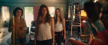 Movie still from “The Final Girls” (2015), directed by Todd Strauss-Schulson – Two women standing next to each other in a room; Medium shot, High angle
