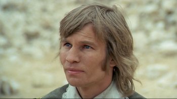 Movie still from “The Four Musketeers: Milady's Revenge” (1974), directed by Richard Lester – A person with long blonde hair; Close Up shot, High angle