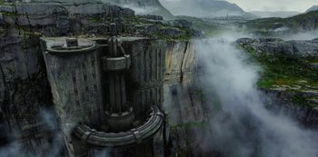 Movie still from “Altered Carbon” (2018), created by Laeta Kalogridis – A view of a waterfall from a distance; Extreme Wide shot, Overhead angle