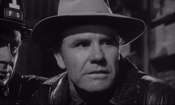 Movie still from “The Fugitive Kind” (1960), directed by Sidney Lumet – An older man wearing a hat and a jacket; Close Up shot, Low angle