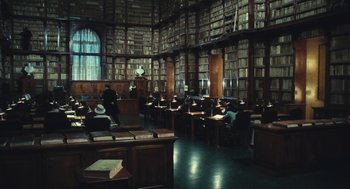 Movie still from “The Garden of the Finzi-Continis” (1970), directed by Vittorio De Sica – A room filled with lots and lots of books; Extreme Wide shot, High angle
