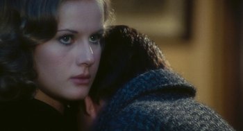 Movie still from “The Garden of the Finzi-Continis” (1970), directed by Vittorio De Sica – A person with a dog; Close Up shot, Over the shoulder angle