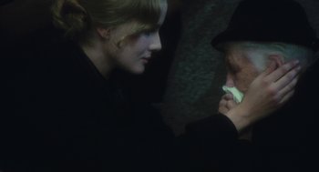Movie still from “The Garden of the Finzi-Continis” (1970), directed by Vittorio De Sica – A woman and a man looking at each other; Close Up shot, Over the shoulder angle