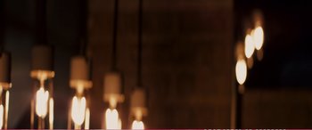 Movie still from “The Girlfriend Experience” (2009), directed by Steven Soderbergh – A blurry image of candles hanging from a ceiling; Close Up shot, Low angle