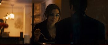 Movie still from “The Girlfriend Experience” (2009), directed by Steven Soderbergh – A woman sitting in front of a man at a table; Medium shot, Over the shoulder angle