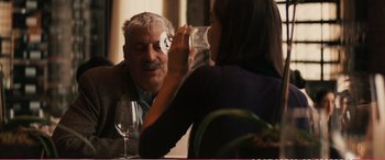Movie still from “The Girlfriend Experience” (2009), directed by Steven Soderbergh – A man and a woman sitting at a dinner table; Close Up shot, Over the shoulder angle