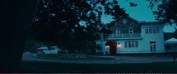 Movie still from “The Girlfriend Experience” (2009), directed by Steven Soderbergh – A house that is lit up at night time; Extreme Wide shot, Low angle