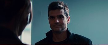 Movie still from “The Girlfriend Experience” (2009), directed by Steven Soderbergh – A person wearing a black shirt; Close Up shot, Over the shoulder angle