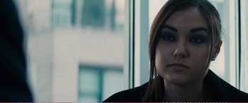 Movie still from “The Girlfriend Experience” (2009), directed by Steven Soderbergh – A woman's face in front of a window; Close Up shot, Over the shoulder angle