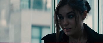 Movie still from “The Girlfriend Experience” (2009), directed by Steven Soderbergh – A person with long hair; Close Up shot, Over the shoulder angle