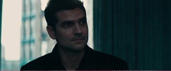 Movie still from “The Girlfriend Experience” (2009), directed by Steven Soderbergh – A person wearing a black shirt; Close Up shot, Over the shoulder angle
