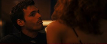 Movie still from “The Girlfriend Experience” (2009), directed by Steven Soderbergh – A person sitting in front of another person; Close Up shot, Over the shoulder angle